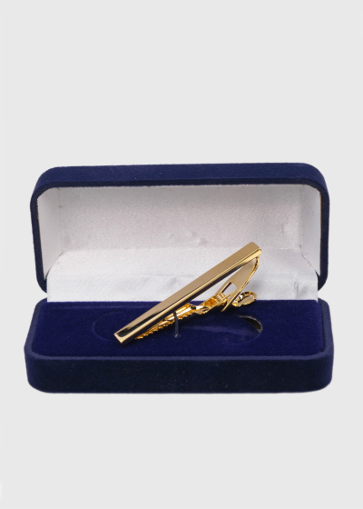 Gold-colored tie clip