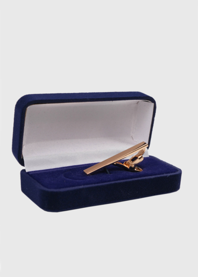 Gold-colored tie clip