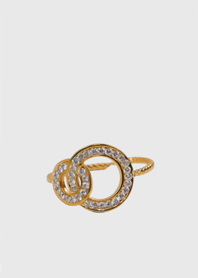 Saint gold-colored ring with crystals