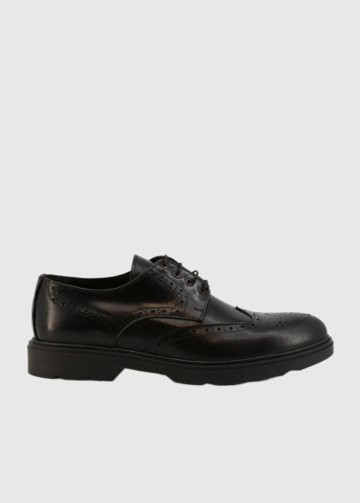 Black leather brogue shoes